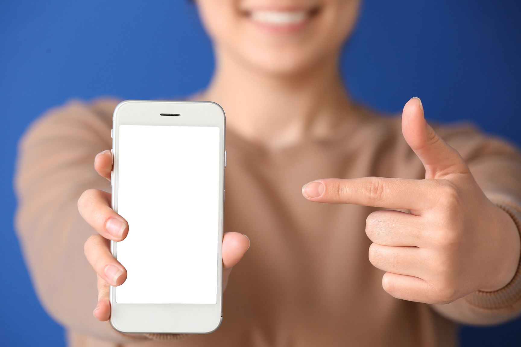 Woman Holding a Mobile Phone